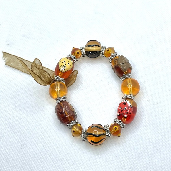 Neutral Warm Toned Glass Beads Bracelet With Hand Painted Animal Design - Picture 3 of 4
